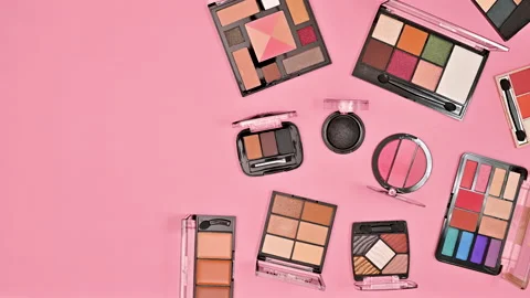 Make up cosmetics move on half of pastel pink background. Flat lay. Stop motion Stock Footage 229498880