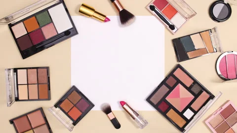 Make up cosmetics products appear around paper card. stop motion Stock Footage 150665946