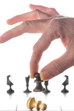 Make decisions and challenge. Chess player makes a move. Man making move wi.. Stock Photos