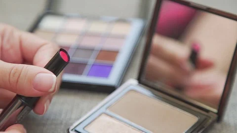 Make-up. Decorative cosmetics: bright lipstick and mirrow 스톡 동영상 76709312