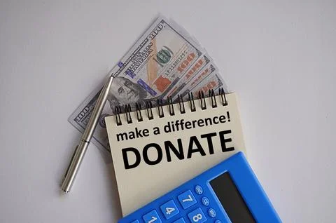 Make a difference note, DONATE, do good, don't be stingy to those in need Foto stock