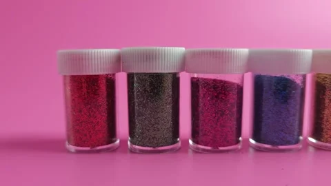 Make DIY crafts using glitter in various colors for fun projects at home Stock Footage 338406254