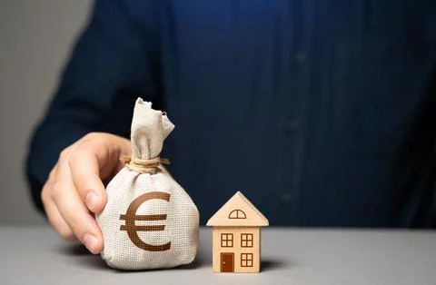 Make a down payment in Euro. Purchase of a house. Buy or sell a house. Issuin Stock Photos