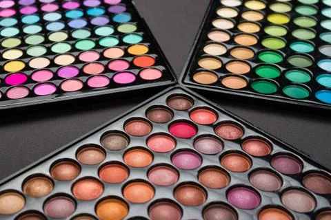 Make-up eyshadow palettes on a black background Stock Photos