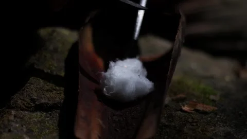 Make fire with Magnesium fire starter Stock Footage 297545297