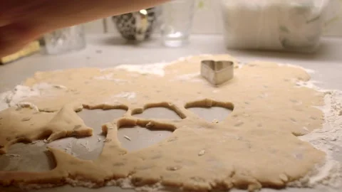 Make food with your hands cookie mold Hands skillfully cutting out various cooki Stock-Footage 295932900