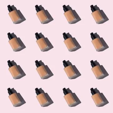 Make up foundation glass bottle pattern on pink Stock Photos