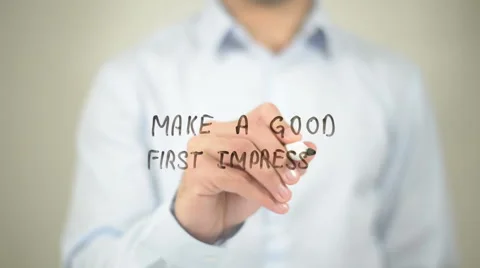 Make A Good First Impression    ,  man writing on transparent wall Stock Footage 62635112