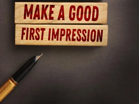 Make a good first impression words on wooden blocks. Human resourses HR marke 库存照片