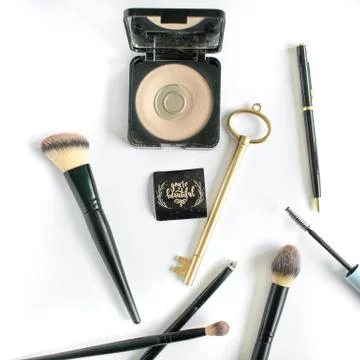 Make up: Half used powder with brushes Stock Photos
