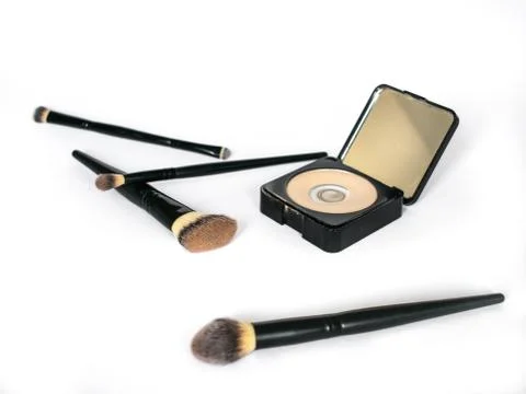 Make up: Half used powder with brushes Foto stock