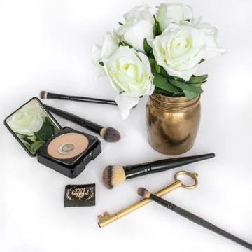 Make up: Half used powder with brushes Stock Photos