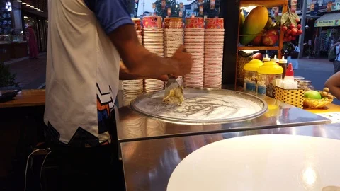 Make ice cream roll in the street. Stock Footage 105804444