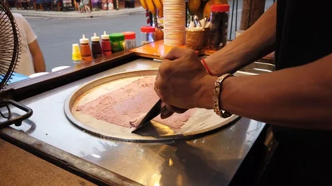 Make ice cream roll in the street. Stock Footage 105804905