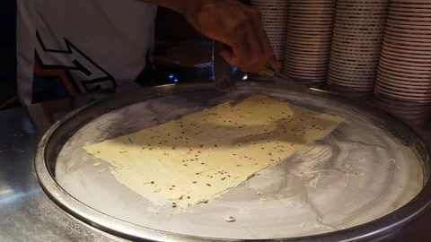 Make ice cream roll in the street. Stock Footage 105805900