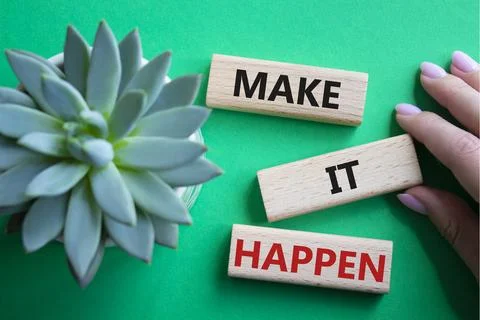 Make it Happen symbol. Concept words Make it Happen on wooden blocks. Beaut.. 스톡 사진