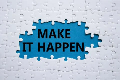 Make it Happen symbol. Concept words Make it Happen on white puzzle. Beauti.. Stock Photos