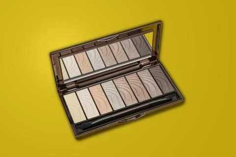 Make item eyeshadow powder multi shades with yellow banner Stock Photos