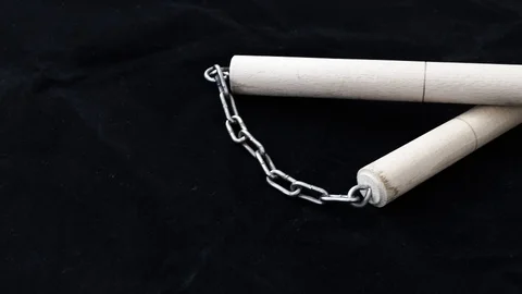 Make kung fu and use nunchaku, nunchaku in japanese culture, defense arts, 動画素材 91262822