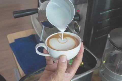 Make latte art coffee Stock Photos