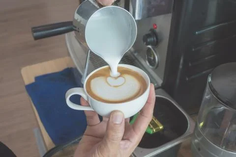 Make latte art coffee Stock Photos