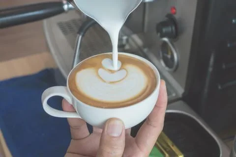 Make latte art coffee Stock Photos