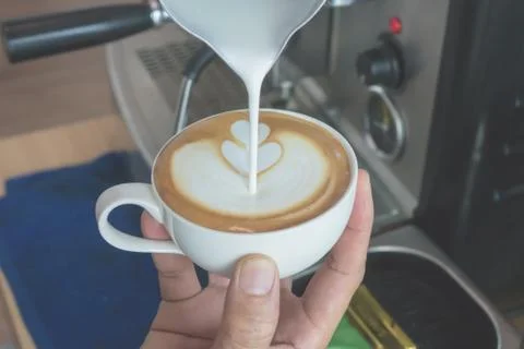 Make latte art coffee Stock Photos