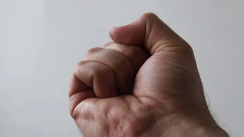 Make a marriage proposal. Close-up of an opening male hand with a wedding ri Stock Footage 123820267