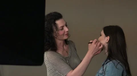 Make-up, medium shot of a side view. Stock Footage 64643544