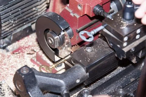 Make a metal key locksmith Stock Photos