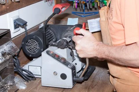 Make a metal key locksmith Stock Photos