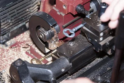 Make a metal key locksmith Stock Photos