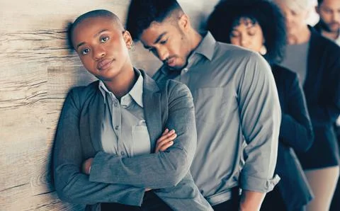 Make mistakes, but dont quit. a young businesspeople looking bored in a waiting Foto stock