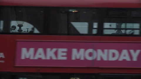 Make Monday Great Again on side of red bus. Stock Footage 93207124