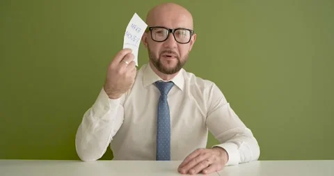 Make Money  - A man presents a note with the word Stock Footage 267089009