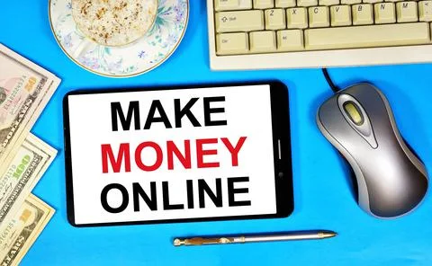 Make money online. The text label on the smartphone screen. Stock Photos