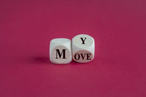 Make my move symbol. Turned the wooden cube with words My move. Stock Photos
