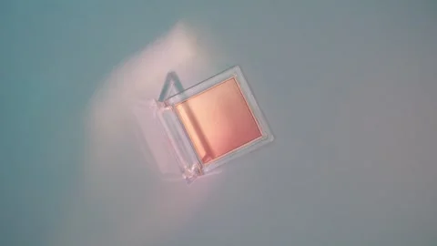 Make-up palette floating over a blue background Stock Footage 303161467