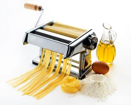 Make pasta with tape machine Stock Photos