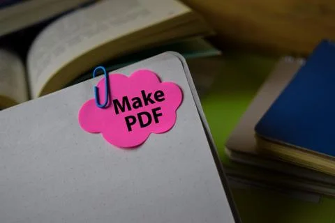 Make PDF write on a sticky note isolated on Office Desk. Stock Photos