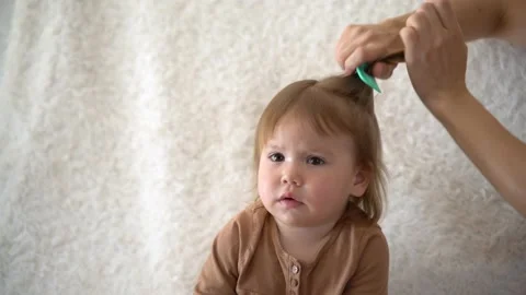 Make a ponytail Stock Footage 237431370