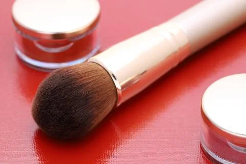 Make up powder and a brush Stock Photos
