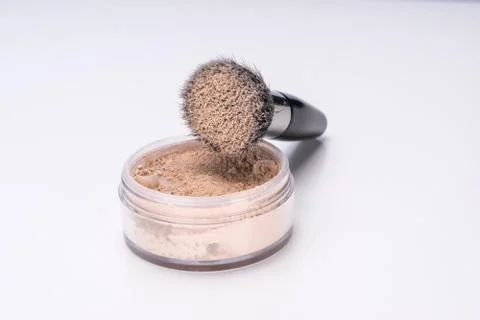 Make-up powder and brush Stock-Fotos