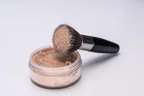 Make-up powder and brush Foto stock