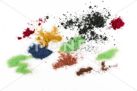Make up powder and colourful glitter on a white background. Stock Photos