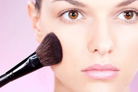 Make up with powder brush Stock Photos