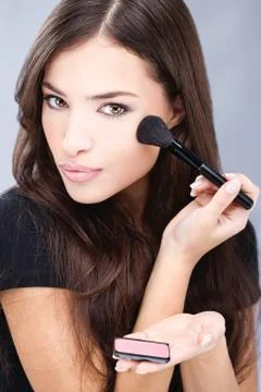 Make up with powder brush Stock Photos