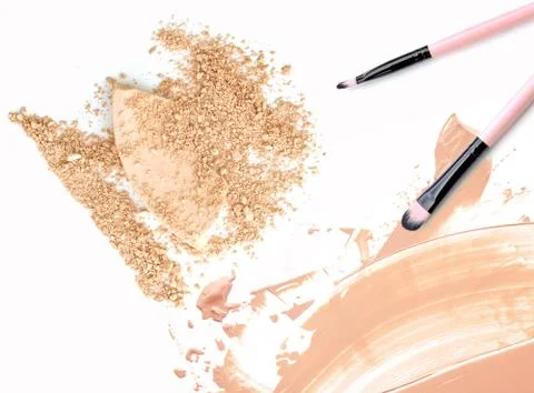 Make up powder on liquid foundation isolated on white Stock Photos