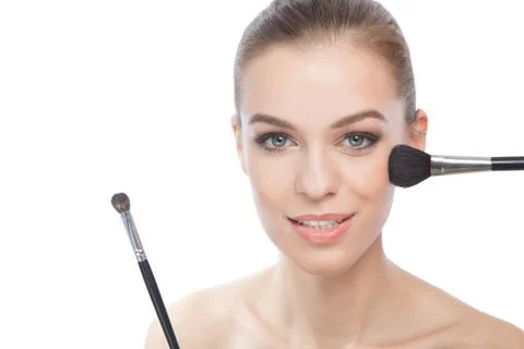 Make-up process on a beautiful women Stock Photos