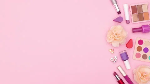 Make up products and accessories appear on left side of pink theme. Stop motion Stock Footage 138278591